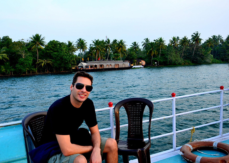 Med on Lake Vembanad in Kerala, India, watching the rice barges.