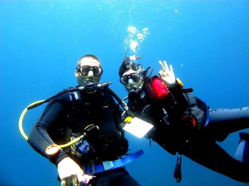 Preya and Med Scuba Diving in Koh Tao Thailand, where they met.